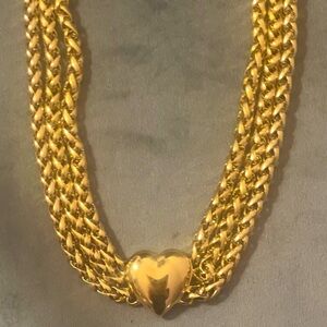 GOLD HEART STATEMENT NECKLACE .